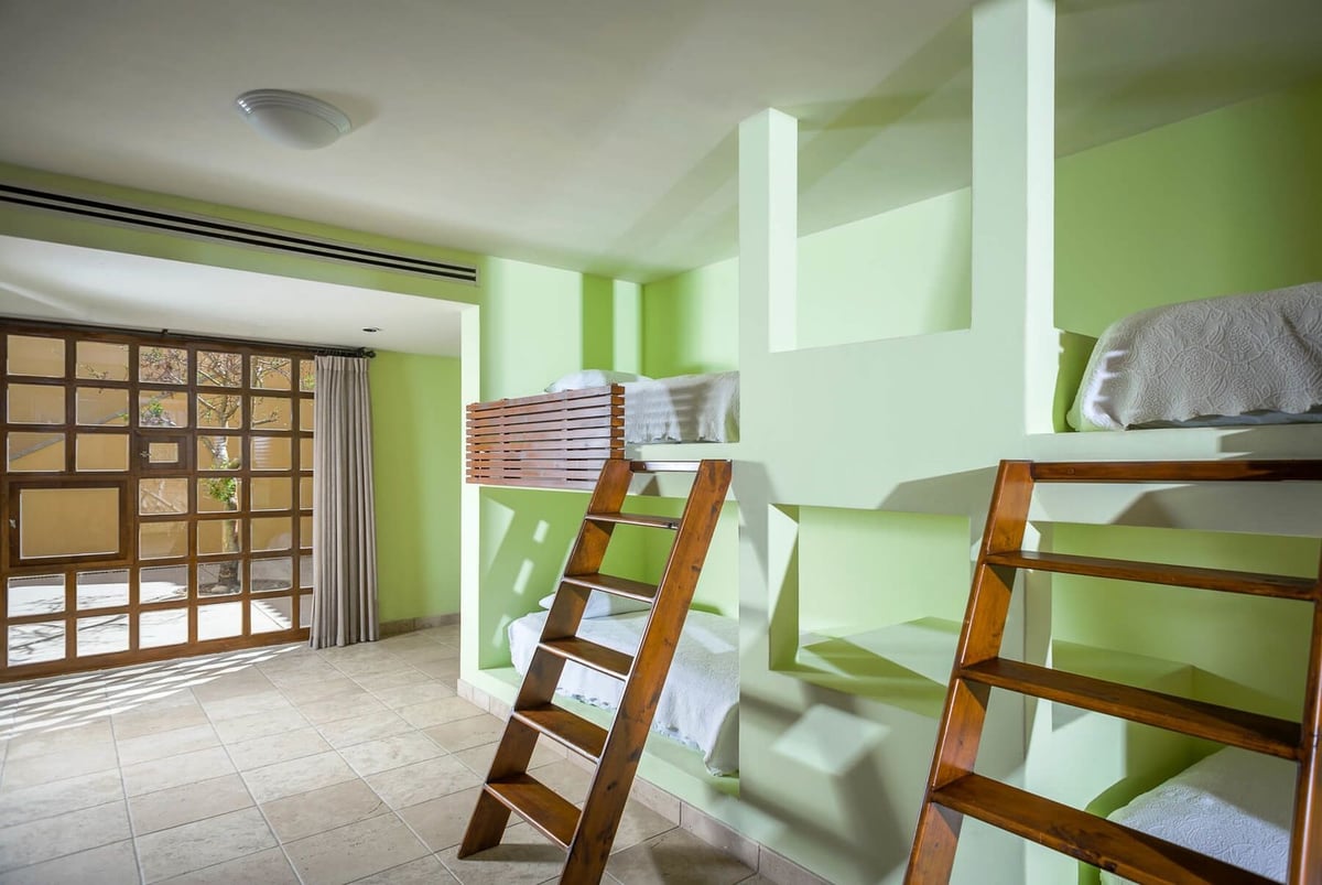 With 2 sets of twin bunk beds in three of the rooms in Casa Tita, you