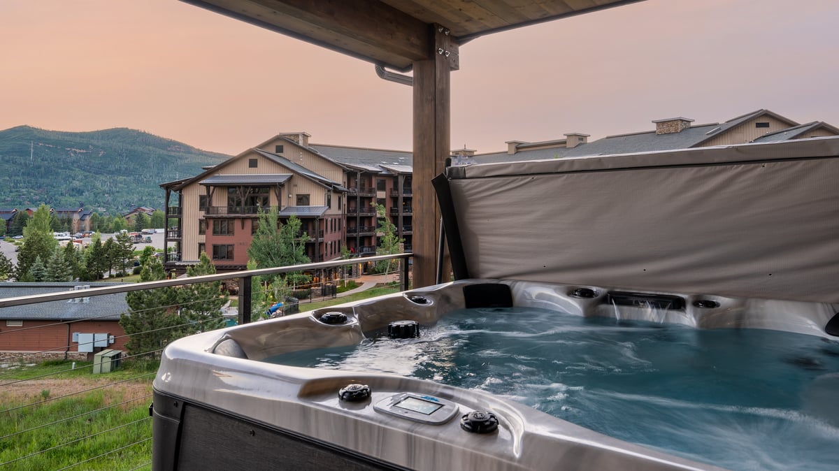Relax in the private outdoor hot tub - Image 27