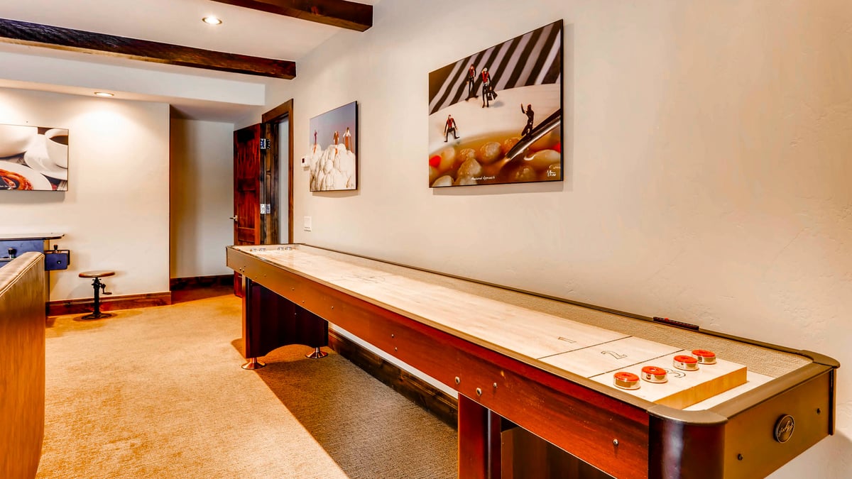Challenge the family to some shuffleboard in the lower level family room - Image 21