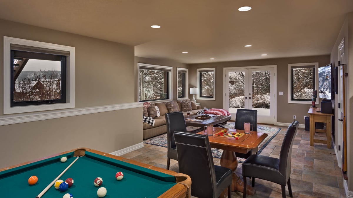 Family room, lower level with billiards and game table and hot tub access - Image 17