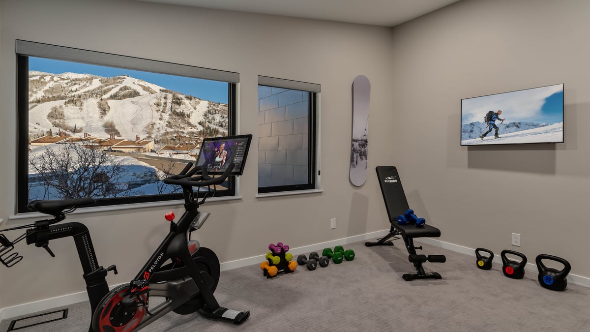 Fold up the Murphy bed and bring out the weights to create a fitness room - Image 25