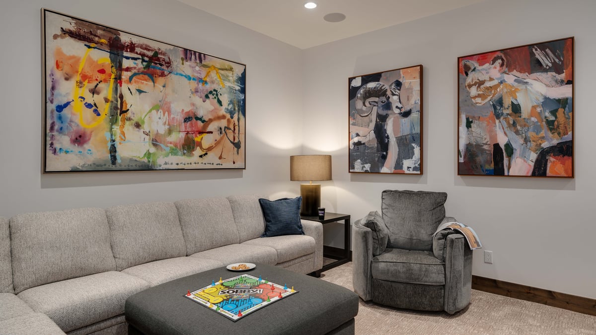 Family room with comfortable seating on the lower level - Image 19