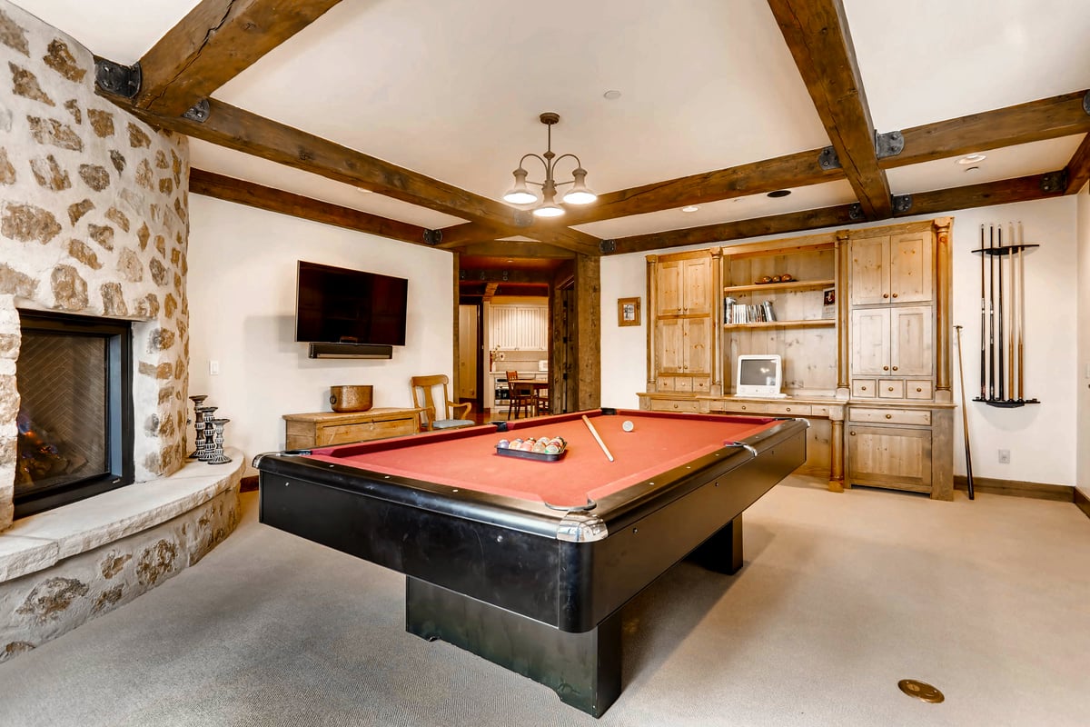 Billiards, TV and fireplace on lower level - Image 31