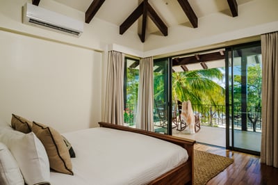 #4. Upstairs, you'll discover the second Master Suite, offering a stunning ocean view directly from 