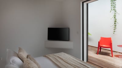 Bedroom 6: A queen size bed, air conditioning, ceiling fan, HD-TV, dish network, safe, dre