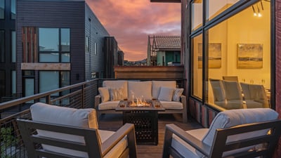 Cozy firepit and seating on the main level deck