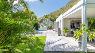 Outdoors: Beautiful garden surrounding the property. Private parking at the entrance. 