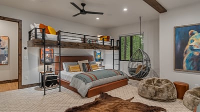 Fun and colorful bunk room on lower level, with two bunk beds - both with two twin beds over a king 