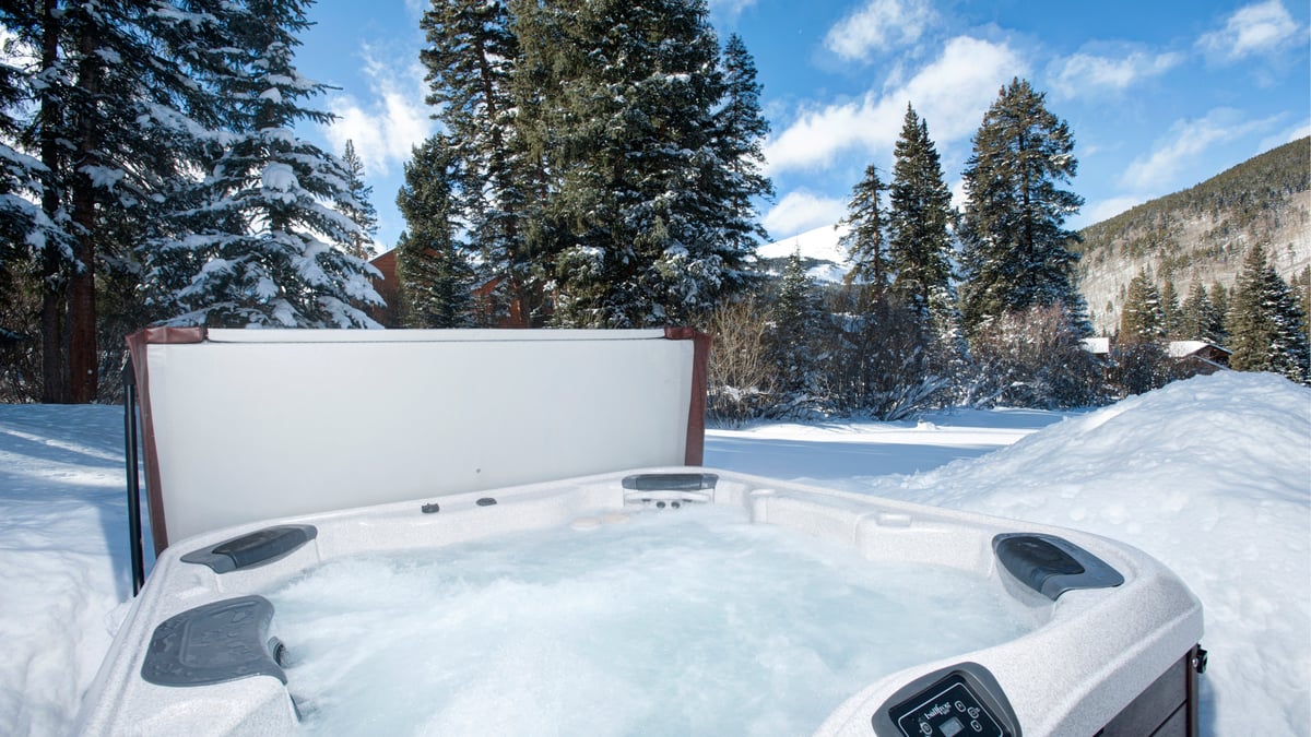 Enjoy an evening soak in your private hot tub after a day on the slopes - Image 8
