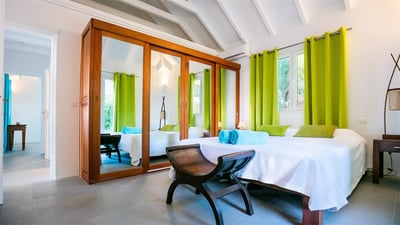 Bedroom 2: King size bed, air conditioning, ceiling fan, safe, large dressing room. Shared Bathroom,