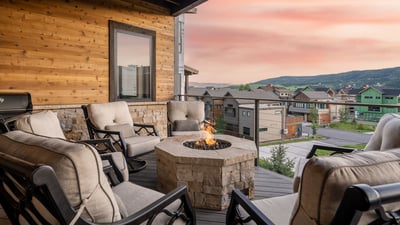 Deck sitting area with BBQ and firepit