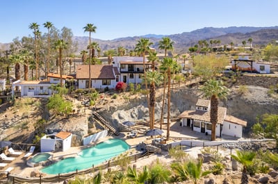 Nestled in the cliffs of Palm Desert, Casa Tierra offers panoramic views of the outdoor oasis right 