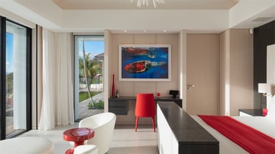 Bedroom 2: This suite is located on the top floor. King size bed, air conditioning, HD-TV, Dish Netw