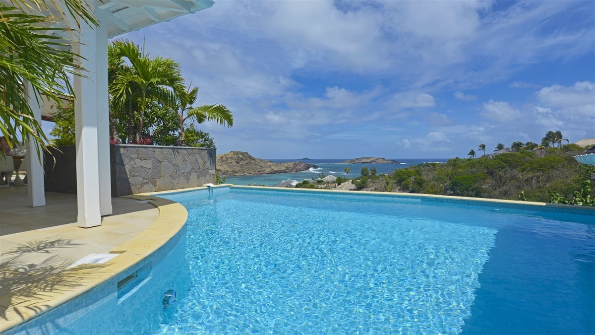 Pool & Terrace: Nice long pool facing the view, expansive terrace with loungers.  - Image 3