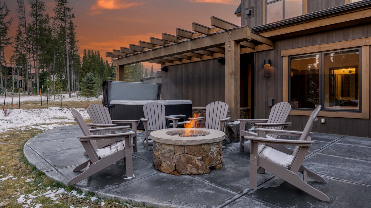 Cozy up around the firepit on the private back patio - Image 3