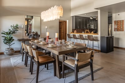 Your elegant dining space flows seamlessly into the modern kitchen, perfect for memorable meals toge