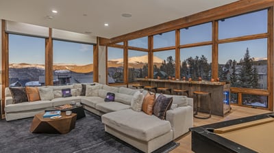 Spectacular family room with high-top bar and views all around