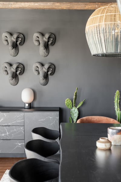 Adorned with Bighorn sheep heads adding style and attitude to the space