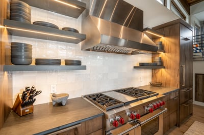 Kitchen has 6-burner gas range, 3 dishwashers, 2 full size refrigerators and 1 full size freezer