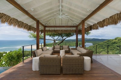 - Gather beneath the thatched roof pavilion with plush seating and sea breezes
- Marvel at panoramic