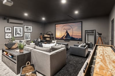 Movie Theatre with top of the line seating, shuffleboard and 10 ft. movie screen!