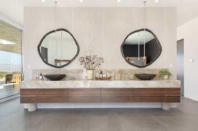 Dual vanities with overhead faucets