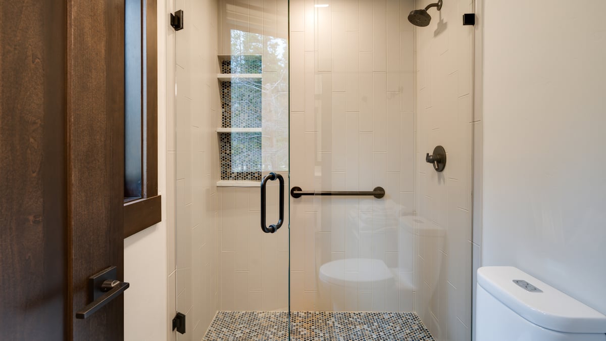 Shared hall bath with walk in shower, upper level - Image 37
