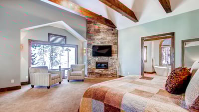 Primary suite with fireplace, on main level