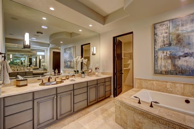 Primary en suite bath with soaking tub, walk in shower, dual vanity and large walk in closet.