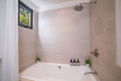 #2. Enjoy the Comfort and Privacy of Your Ensuite Bathroom with a bathtub and all the bathroom essen