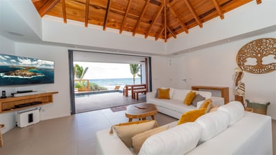Living Area: Air-conditioning, HD-TV, Dish Network, Sonos sound system. The room opens directly onto