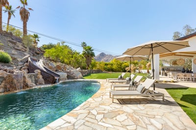 Large pool with your own waterslide!