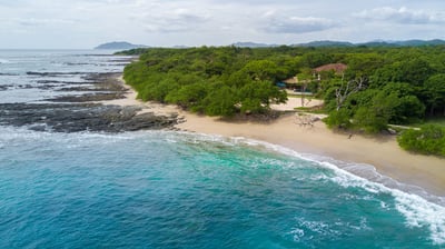 A white sandy beach just within reach.