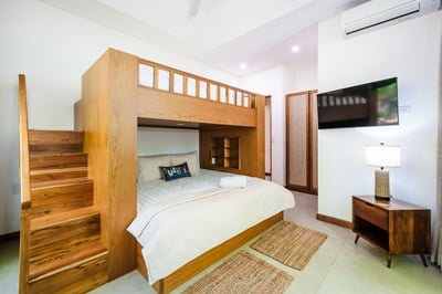 #2.  Queen-over-King Loft Bed, Ensuite Bathroom, AC, Smart TV, Safe, Closet.