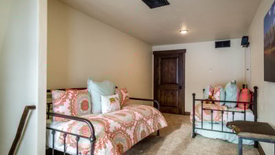 Primary suite loft with extra beds