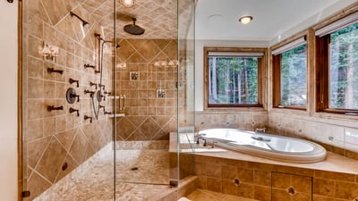 En suite bathroom for King bedroom with dual shower heads