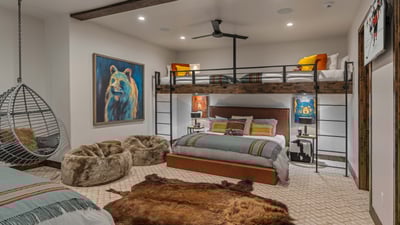 Fun and colorful bunk room on lower level, with two bunk beds - both with two twin beds over a king 