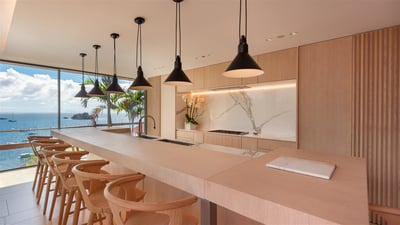 Kitchen & Dining Area: Fully equipped, air conditioning, breakfast bar with six stools, gas oven, re