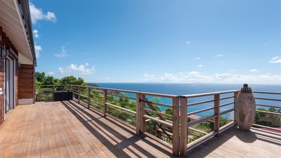 Outdoors: Panoramic views over the bay and the ocean. Private parking at the entrance of the propert