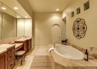 Primary en suite bath with large tub and walk-in shower with dual shower heads