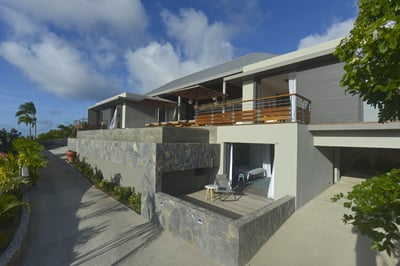 Outdoors: Garden with lounge area on the back of the property, gas barbecue. 