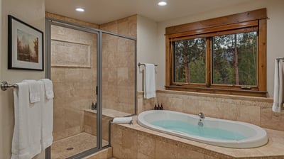 Bedroom 1, Upper Level - Primary king ensuite with soaking tub and shower