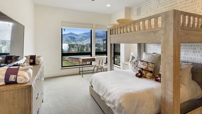 Bunkroom with desk area and views
