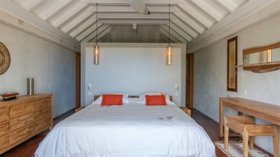 Bedroom 1: King size bed, air-conditioning, ceiling fan. Ensuite Bathroom, hair dryer, safe. 