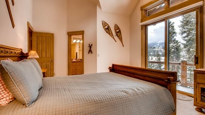 King suite on upper level with deck