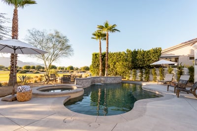 Great patio views - across the pool and golf course to the sunsetting over the mountains
