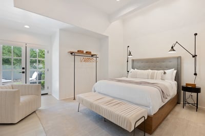Suite 4: Queen bed with a modern look perfect for the readers in the group with patio access and a S