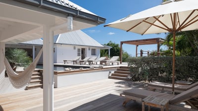 Outdoors: Beautiful garden surrounding the property. Private parking at the entrance. 
