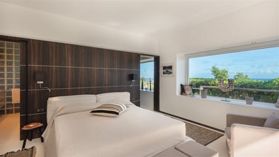 Bedroom 5: Located on the lover level. Direct access to the fitness room. King size bed (can be