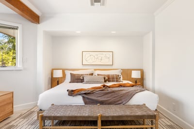 Iron: Guest bedroom two on second floor with King bed and direct access to shared bathroom with Copp